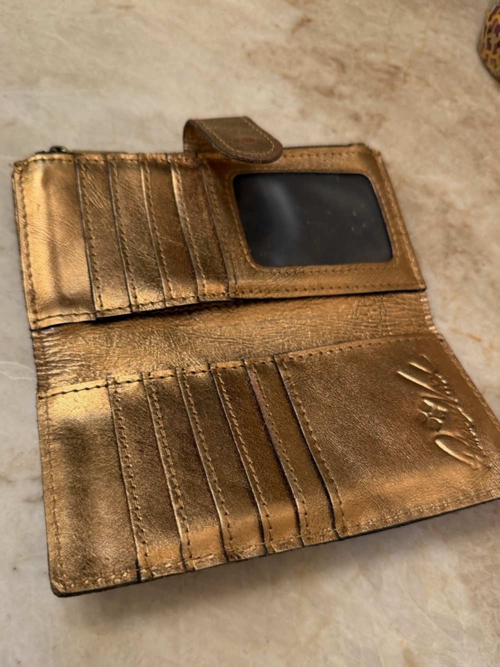 Patricia Nash slim metallic bifold
Wallet - Picture 4 of 10